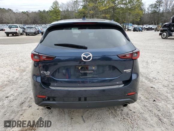 2022 Mazda CX-5 2.5 Turbo with VIN JM3KFBAY3N0603921, listed as a Copart auction lot 43679495 with 27,073 mi miles and Salvage Title. Bid and sale history available at carsss.com. Image 6.