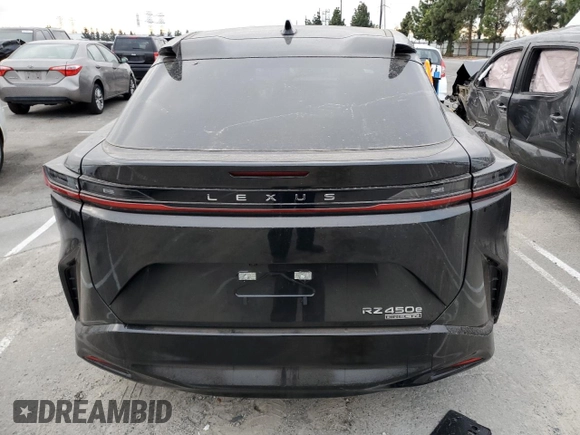 2024 Lexus RZ 450e Premium with VIN JTJAAAABXRA026441, listed as a Copart auction lot 82375054 with Not provided miles and Salvage title. Bid and sale history available at DreamBid. Image 6.