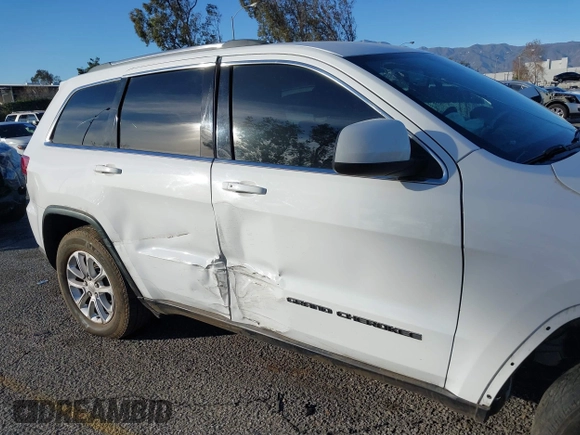 2021 Jeep Grand Cherokee Laredo X with VIN 1C4RJEAG2MC719395, listed as a IAAI auction lot 41338484 with 99,636 mi miles and . Bid and sale history available at DreamBid. Image 17.