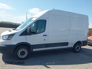 2023 Ford Transit Cargo with VIN 1FTBR1X80PKB45974, listed as a IAAI auction lot 42609404 with 35,940 mi miles and . Bid and sale history available at DreamBid. Image 14.