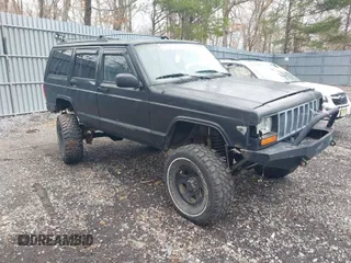 2000 Jeep Cherokee Police with VIN 1J4FF48S5YL106549, listed as a IAAI auction lot 41803451 with 284,186 mi miles. Bid and sale history available at carsss.com. Image 1.