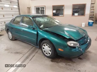 1996 Ford Taurus GL z VIN 1FALP52U5TG110582, wystawiony jako IAAI lot #40858639 z przebiegiem 57 965 mil mil oraz . Historia ofert i sprzedaży dostępna na DreamBid. Obrazek 1.