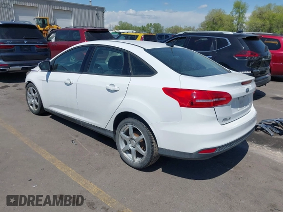 2017 Ford Focus SE with VIN 1FADP3F24HL232527, listed as a IAAI auction lot 42110702 with 95,327 mi miles and . Bid and sale history available at DreamBid. Image 3.
