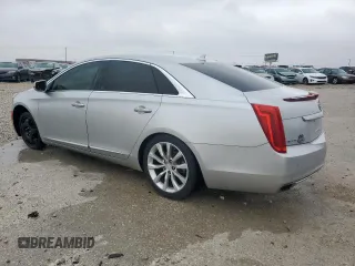 2013 Cadillac XTS Luxury with VIN 2G61P5S38D9199527, listed as a Copart auction lot 56157915 with 90,448 mi miles and Clean title. Bid and sale history available at DreamBid. Image 2.
