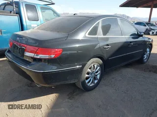 2008 Hyundai Azera Limited z VIN KMHFC46F38A287792, wystawiony jako IAAI lot #42397354 z przebiegiem 101 209 mil mil oraz . Historia ofert i sprzedaży dostępna na DreamBid. Obrazek 4.