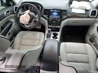 2019 Jeep Grand Cherokee Summit with VIN 1C4RJFJT8KC558499, listed as a Copart auction lot 54074725 with 65,844 mi miles and Salvage title. Bid and sale history available at DreamBid. Image 8.