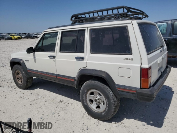 1996 Jeep Cherokee Sport with VIN 1J4FJ68S1TL128597, listed as a Copart auction lot 49600545 with 201,074 mi miles and Salvage title. Bid and sale history available at DreamBid. Image 2.