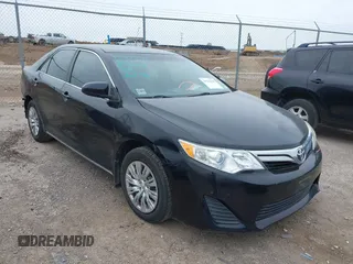 2014 Toyota Camry L with VIN 4T4BF1FK2ER390414, listed as a IAAI auction lot 41936368 with 164,811 mi miles and . Bid and sale history available at DreamBid. Image 1.