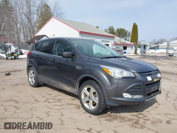 2015 Ford Escape SE with VIN 1FMCU0GXXFUB99852, listed as a IAAI auction lot 41704198 with 84,735 mi miles. Bid and sale history available at carsss.com. Image 1.