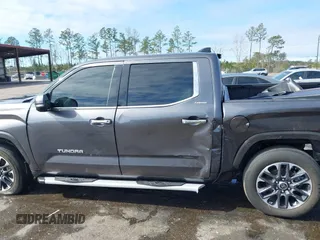 2022 Toyota Tundra Limited with VIN 5TFJA5AB7NX011302, listed as a IAAI auction lot 41400983 with 93,747 mi miles and . Bid and sale history available at DreamBid. Image 14.