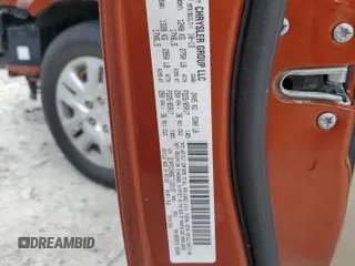 2014 Dodge Journey American Value with VIN 3C4PDCAB8ET133197, listed as a Copart auction lot 51381145 with 191,269 mi miles and Salvage title. Bid and sale history available at DreamBid. Image 13.