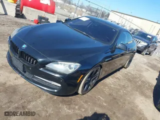 2012 BMW 6 Series 650i xDrive with VIN WBALX5C59CC894030, listed as a IAAI auction lot 41763126 with 115,562 mi miles. Bid and sale history available at carsss.com. Image 2.