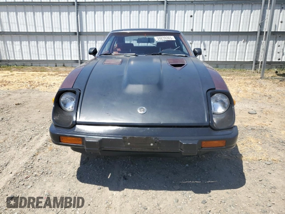 1982 Datsun 280ZX 2+2 z VIN JN1HZ06S5CX429361, wystawiony jako Copart lot #59239365 z przebiegiem 139 002 mil mil oraz Tytuł czysty. Historia ofert i sprzedaży dostępna na DreamBid. Obrazek 5.