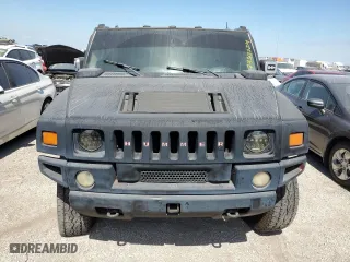 2003 Hummer H2 with VIN 5GRGN23U13H143781, listed as a Copart auction lot 74318724 with 0 mi miles and Salvage Title. Bid and sale history available at carsss.com. Image 5.