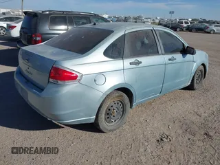 2009 Ford Focus S with VIN 1FAHP34N39W211005, listed as a IAAI auction lot 40666052 with 1 mi miles. Bid and sale history available at carsss.com. Image 4.