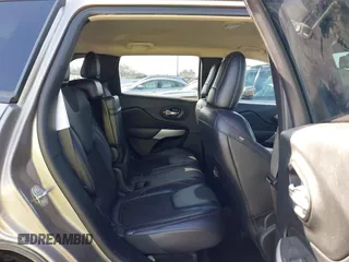 2017 Jeep Cherokee Trailhawk L Plus with VIN 1C4PJMBB6HW654172, listed as a IAAI auction lot 41851236 with 104,263 mi miles. Bid and sale history available at carsss.com. Image 8.