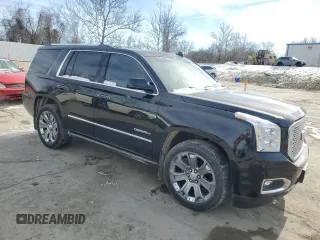 2015 GMC Yukon Denali with VIN 1GKS2CKJ5FR605263, listed as a Copart auction lot 45307355 with 128,245 mi miles and Clean Title. Bid and sale history available at carsss.com. Image 4.