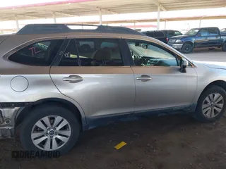 2015 Subaru Outback Premium with VIN 4S4BSACC0F3325927, listed as a IAAI auction lot 42450142 with 140,566 mi miles and . Bid and sale history available at DreamBid. Image 14.