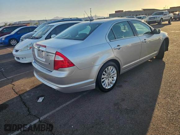 2011 Ford Fusion Hybrid with VIN 3FADP0L36BR251407, listed as a Copart auction lot 46709665 with 129,972 mi miles and Clean Title. Bid and sale history available at carsss.com. Image 4.
