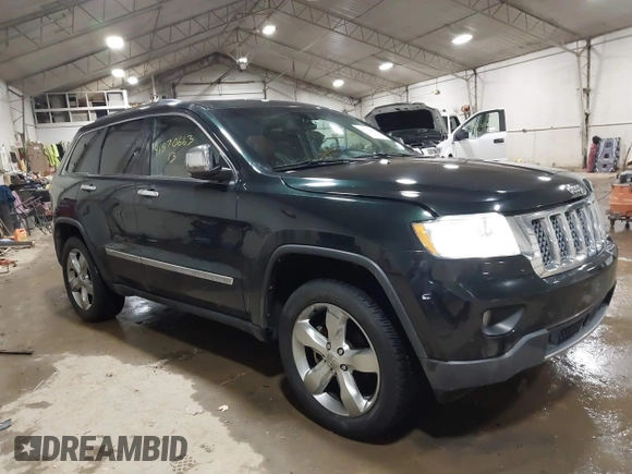 2013 Jeep Grand Cherokee Overland with VIN 1C4RJECT4DC526465, listed as a IAAI auction lot 41570663 with 116,948 mi miles. Bid and sale history available at carsss.com. Image 1.