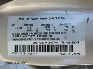 1999 Mazda Millenia z VIN JM1TA2217X1502746, wystawiony jako Copart lot #72165894 z przebiegiem 196 957 mil mil oraz Szkody całkowita. Historia ofert i sprzedaży dostępna na DreamBid. Obrazek 12.