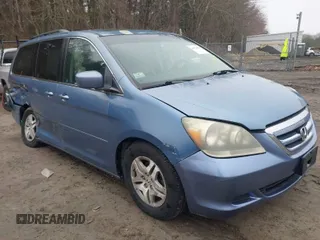 2007 Honda Odyssey EX-L z VIN 5FNRL38707B056386, wystawiony jako IAAI lot #41926323 z przebiegiem 210 633 mil mil oraz . Historia ofert i sprzedaży dostępna na DreamBid. Obrazek 1.