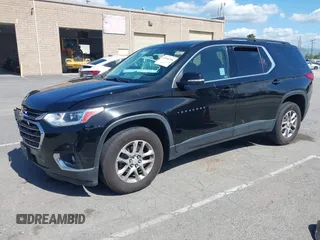 2021 Chevrolet Traverse LT Cloth with VIN 1GNERGKW9MJ162089, listed as a IAAI auction lot 41944248 with 99,586 mi miles. Bid and sale history available at carsss.com. Image 2.
