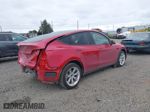 2023 Tesla Model Y Long Range with VIN 7SAYGDEE9PA145947, listed as a IAAI auction lot 42131783 with 4,956 mi miles and . Bid and sale history available at DreamBid. Image 4.