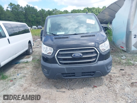 2020 Ford Transit Cargo with VIN 1FTYE1Y86LKA27345, listed as a IAAI auction lot 42577599 with 67,182 mi miles and . Bid and sale history available at DreamBid. Image 12.