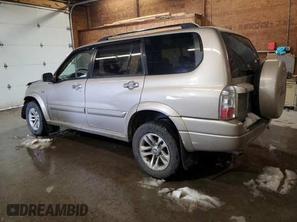 2005 Suzuki XL7 LX with VIN JS3TX92V054105984, listed as a Copart auction lot 89070865 with 135,453 mi miles and Salvage title. Bid and sale history available at DreamBid. Image 2.