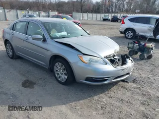 2014 Chrysler 200 LX with VIN 1C3CCBAB9EN204844, listed as a IAAI auction lot 41002852 with 143,439 mi miles. Bid and sale history available at carsss.com. Image 1.