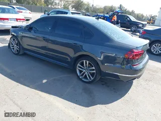 2018 Volkswagen Passat 2.0T S with VIN 1VWAA7A34JC025600, listed as a IAAI auction lot 41594079 with 92,019 mi miles. Bid and sale history available at carsss.com. Image 3.