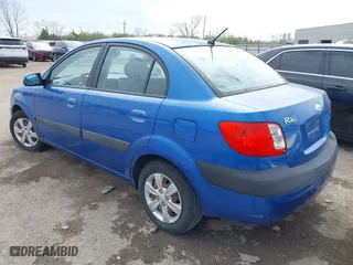 2008 Kia Rio LX with VIN KNADE123486430555, listed as a IAAI auction lot 41875641 with 121,280 mi miles. Bid and sale history available at carsss.com. Image 3.