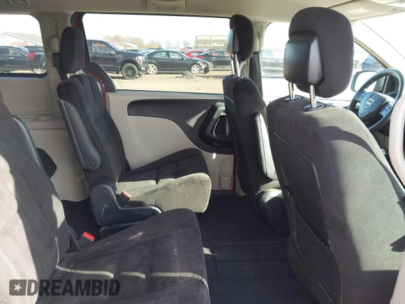 2014 Dodge Grand Caravan SXT with VIN 2C4RDGCG8ER245316, listed as a IAAI auction lot 41871425 with 150,361 mi miles and . Bid and sale history available at DreamBid. Image 8.