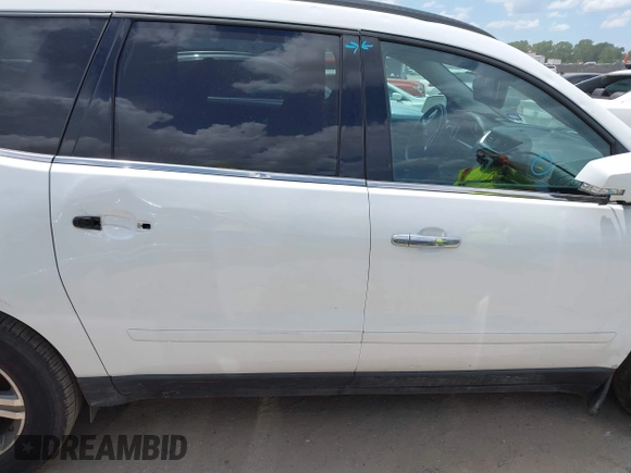 2016 Chevrolet Traverse LT with VIN 1GNKRGKD3GJ264459, listed as a IAAI auction lot 42549830 with 191,119 mi miles and . Bid and sale history available at DreamBid. Image 13.