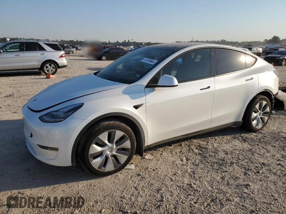 2023 Tesla Model Y Long Range z VIN 7SAYGDEE8PA069248, wystawiony jako Copart lot #74120944 z przebiegiem 17 085 mil mil oraz Szkoda całkowita • Salvage title. Historia ofert i sprzedaży dostępna na DreamBid. Obrazek 1.