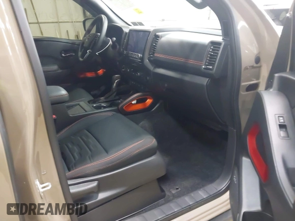 2024 Nissan Frontier SV with VIN 1N6ED1EK8RN613989, listed as a IAAI auction lot 42310148 with 14,202 mi miles and . Bid and sale history available at DreamBid. Image 5.