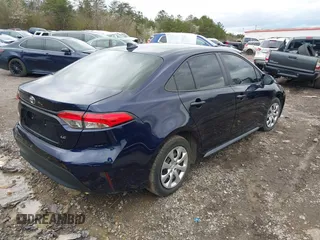 2023 Toyota Corolla LE with VIN 5YFB4MDEXPP032982, listed as a IAAI auction lot 41728893 with 21,887 mi miles and . Bid and sale history available at DreamBid. Image 4.