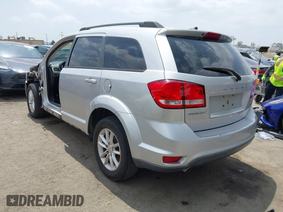 2013 Dodge Journey SXT with VIN 3C4PDCBG9DT506384, listed as a IAAI auction lot 42119685 with 143,769 mi miles. Bid and sale history available at carsss.com. Image 3.