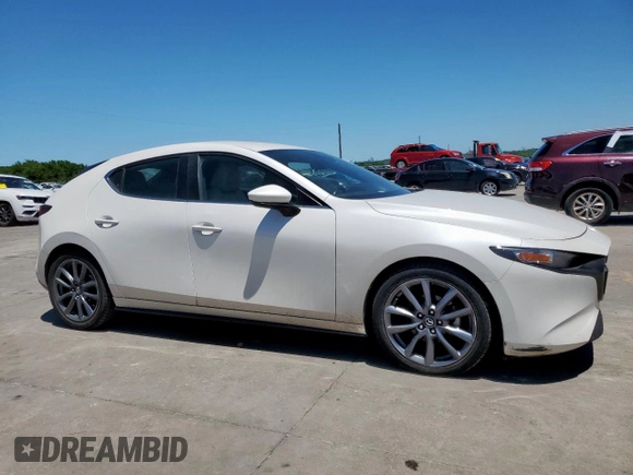 2019 Mazda 3 z VIN JM1BPAJM3K1131108, wystawiony jako Copart lot #57911165 z przebiegiem 65 641 mil mil oraz Szkoda całkowita • Salvage title. Historia ofert i sprzedaży dostępna na DreamBid. Obrazek 4.