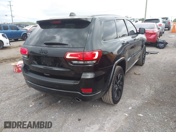 2020 Jeep Grand Cherokee Laredo E with VIN 1C4RJEAG7LC324904, listed as a IAAI auction lot 42600961 with 93,444 mi miles and . Bid and sale history available at DreamBid. Image 4.