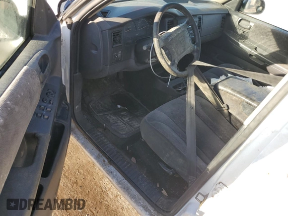 2001 Dodge Dakota z VIN 1B7HL2AX41S256519, wystawiony jako Copart lot #81951634 z przebiegiem Nie podano mil oraz Nie do naprawy • Non repairable. Historia ofert i sprzedaży dostępna na DreamBid. Obrazek 8.