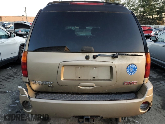 2004 GMC Envoy SLE with VIN 1GKET16S546126499, listed as a Copart auction lot 86567554 with Not provided miles and Salvage title. Bid and sale history available at DreamBid. Image 6.