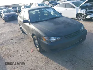 2002 Toyota Corolla CE with VIN 1NXBR12E72Z595031, listed as a IAAI auction lot 42525694 with 195,204 mi miles and . Bid and sale history available at DreamBid. Image 1.
