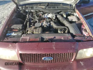2006 Ford Police Interceptor with VIN 2FAFP71W06X165970, listed as a Copart auction lot 76293344 with 180,661 mi miles and Salvage title. Bid and sale history available at DreamBid. Image 11.
