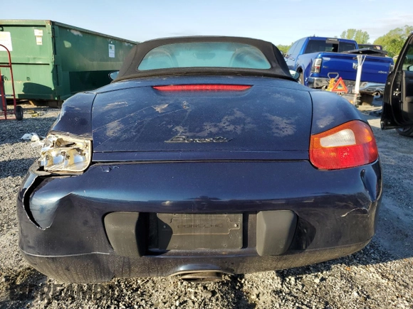 2000 Porsche Boxster с VIN WP0CA2989YU627749, выставлен на аукционе Copart как лот 54054305 с пробегом 189 173 миль миль и Списание • Salvage title. История ставок и продаж доступна на DreamBid. Изображение 6.