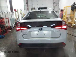 2021 Toyota Prius LE with VIN JTDL9MFU9M3025214, listed as a IAAI auction lot 41375860 with 76,259 mi miles and . Bid and sale history available at DreamBid. Image 17.