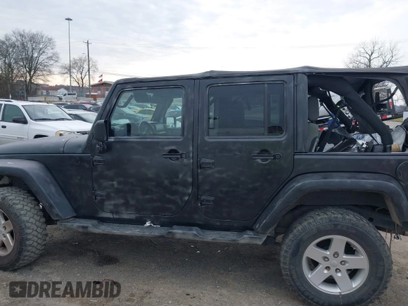 2008 Jeep Wrangler Unlimited X with VIN 1J8GA39148L577903, listed as a IAAI auction lot 41564957 with 95,359 mi miles. Bid and sale history available at carsss.com. Image 14.