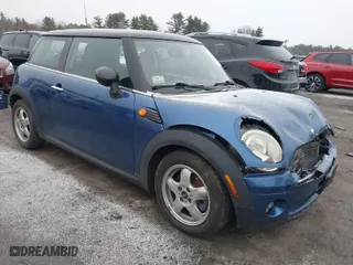 2009 MINI Cooper Hardtop with VIN WMWMF33579TW72543, listed as a IAAI auction lot 41844387 with 125,835 mi miles. Bid and sale history available at carsss.com. Image 1.