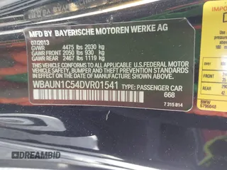 2013 BMW 1 Series 128i with VIN WBAUN1C54DVR01541, listed as a IAAI auction lot 42802640 with 119,881 mi miles and . Bid and sale history available at DreamBid. Image 9.